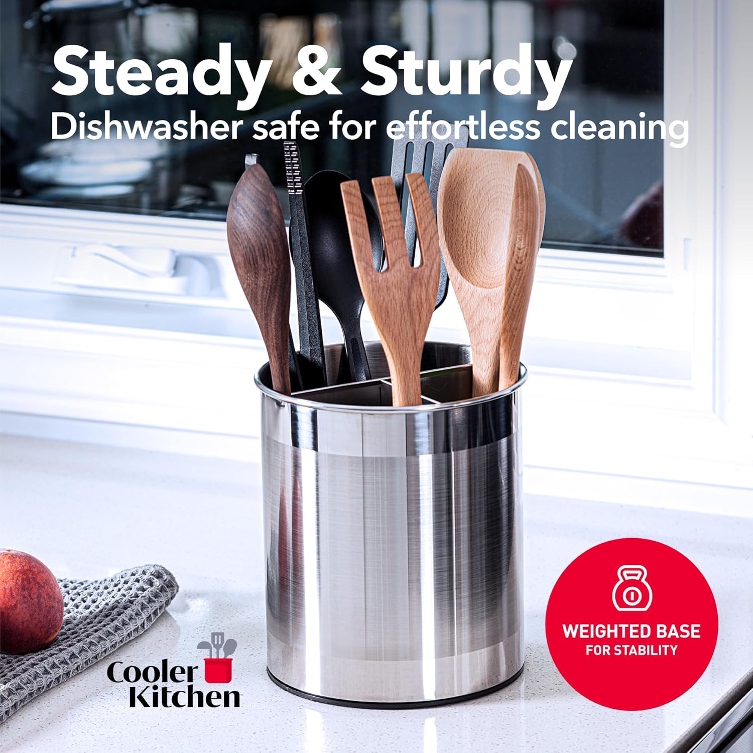 Stainless steel utensil holder with wooden and metal utensils on a kitchen counter, featuring Cooler Kitchen branding.