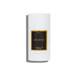 White deodorant stick with 'Les Deux' branding on a white background