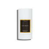 White deodorant stick with 'Les Deux' branding on a white background