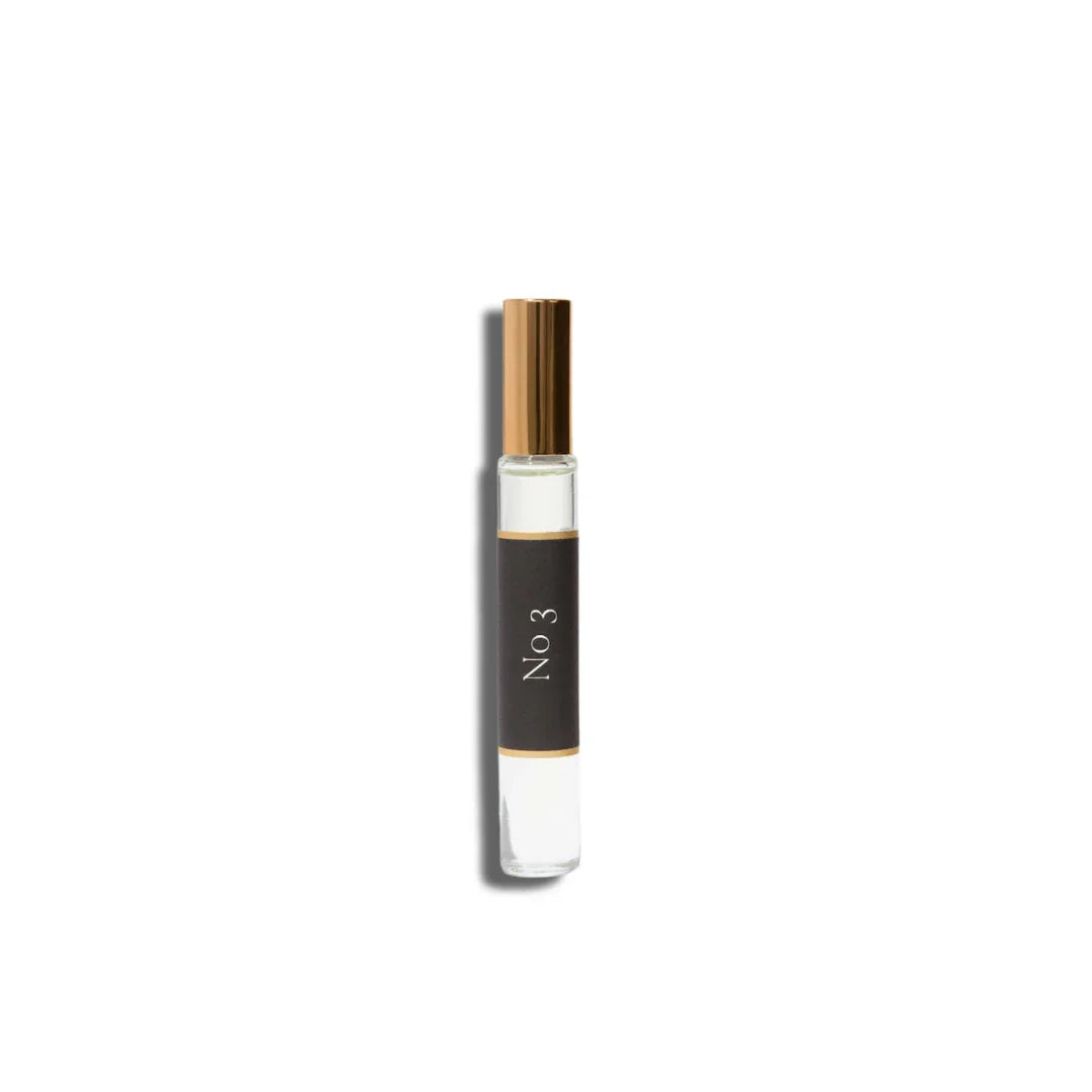 Small perfume bottle labeled 'No 3' on a white background