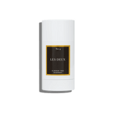 White deodorant stick with 'Les Deux' branding on a white background