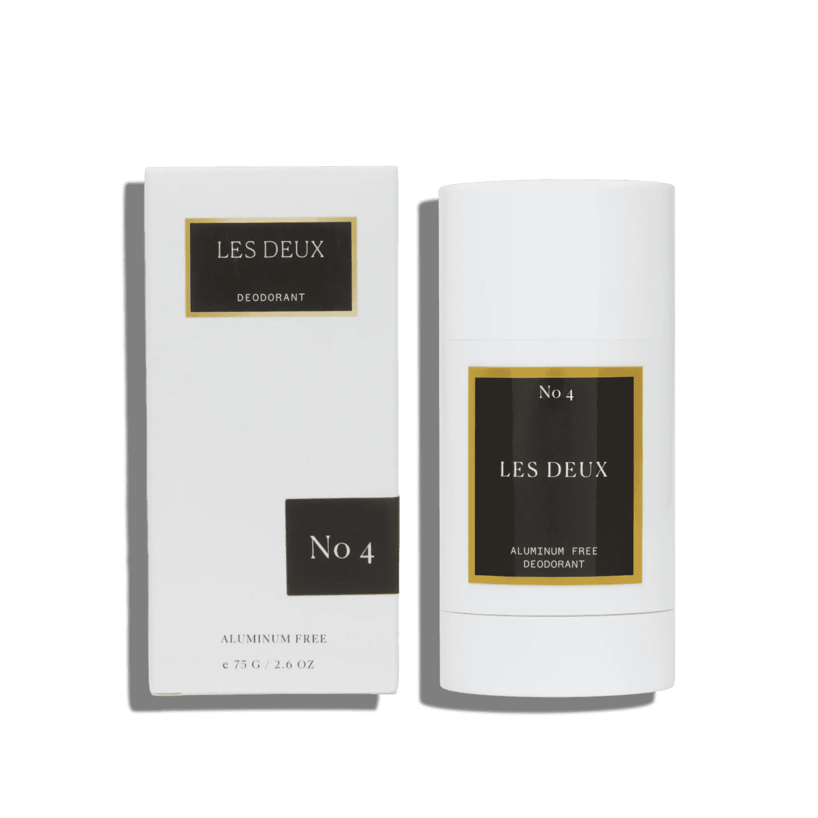 Deodorant stick and packaging with 'Les Deux' branding on a green background