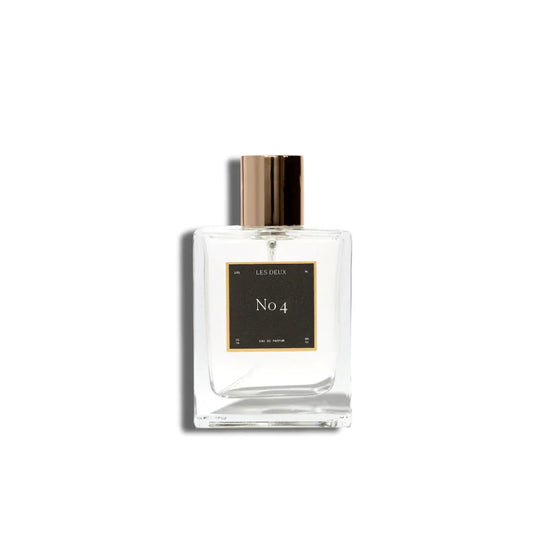 Perfume bottle labeled 'No. 4' by Les Deux on a white background