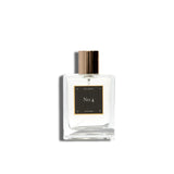 Perfume bottle labeled 'No. 4' by Les Deux on a white background