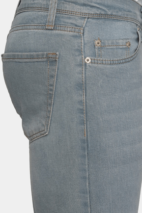 Close-up of blue jeans on a white background