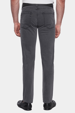 Person wearing gray pants on a white background