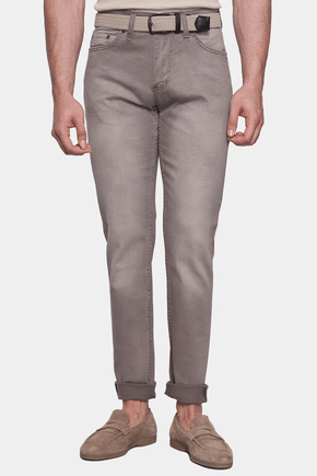 Person wearing gray jeans on a white background