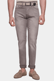 Person wearing gray jeans on a white background