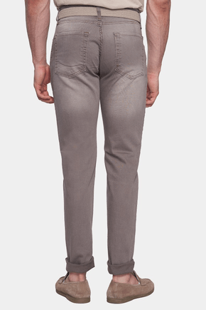 Person wearing gray pants on a white background