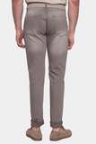 Person wearing gray pants on a white background